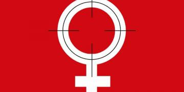 A white planetary symbol for Venus - used as a gender symbol for women - with a target on it.