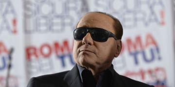 Silvio Berlusconi with cool black sunglasses