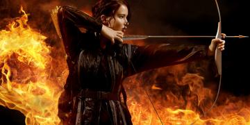 Katniss Everdeen shooting a bow
